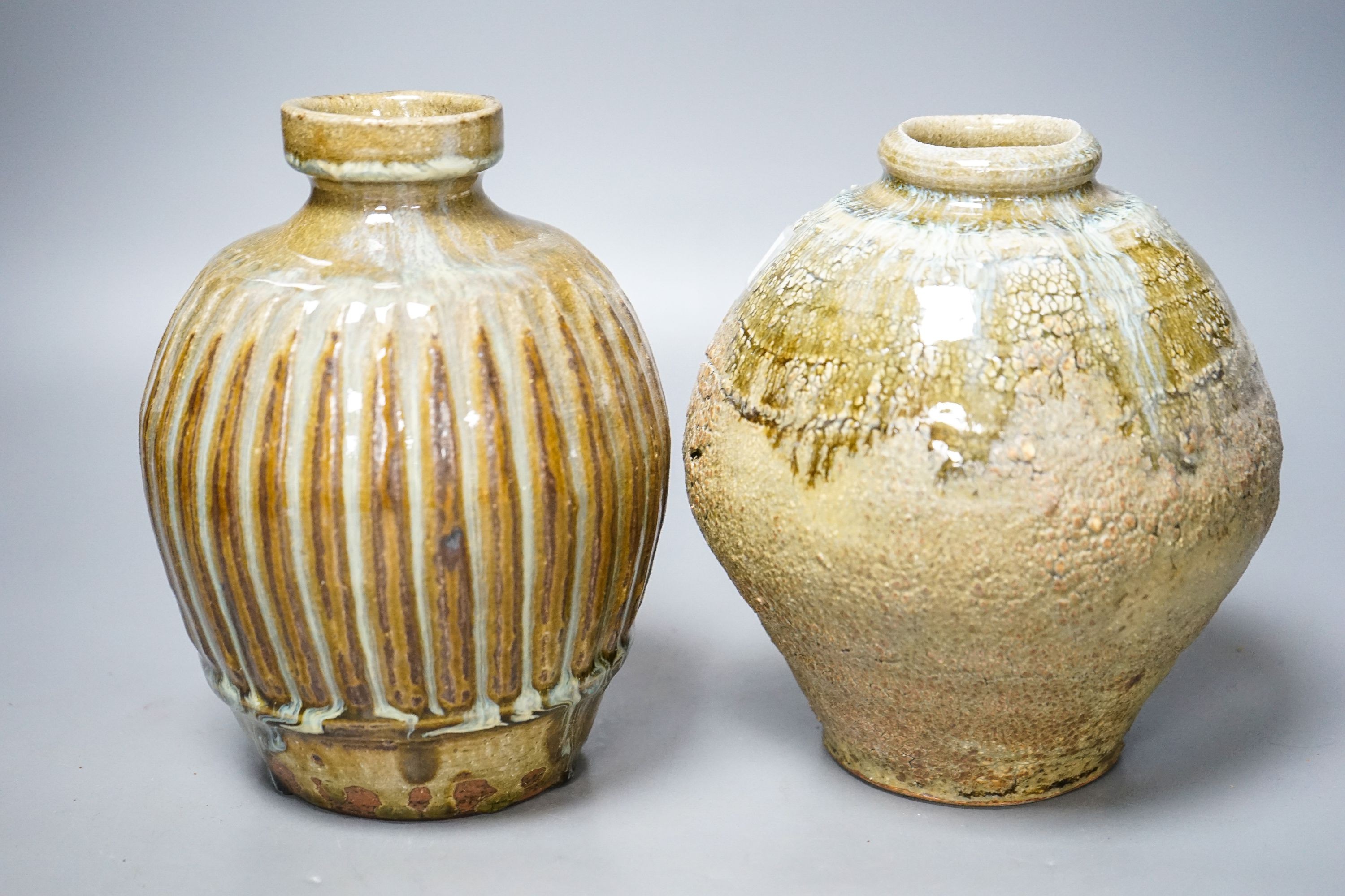Mike Dodd (b.1943), a fluted globular stoneware vase and an ash glazed globular vase, tallest 18cm (2)